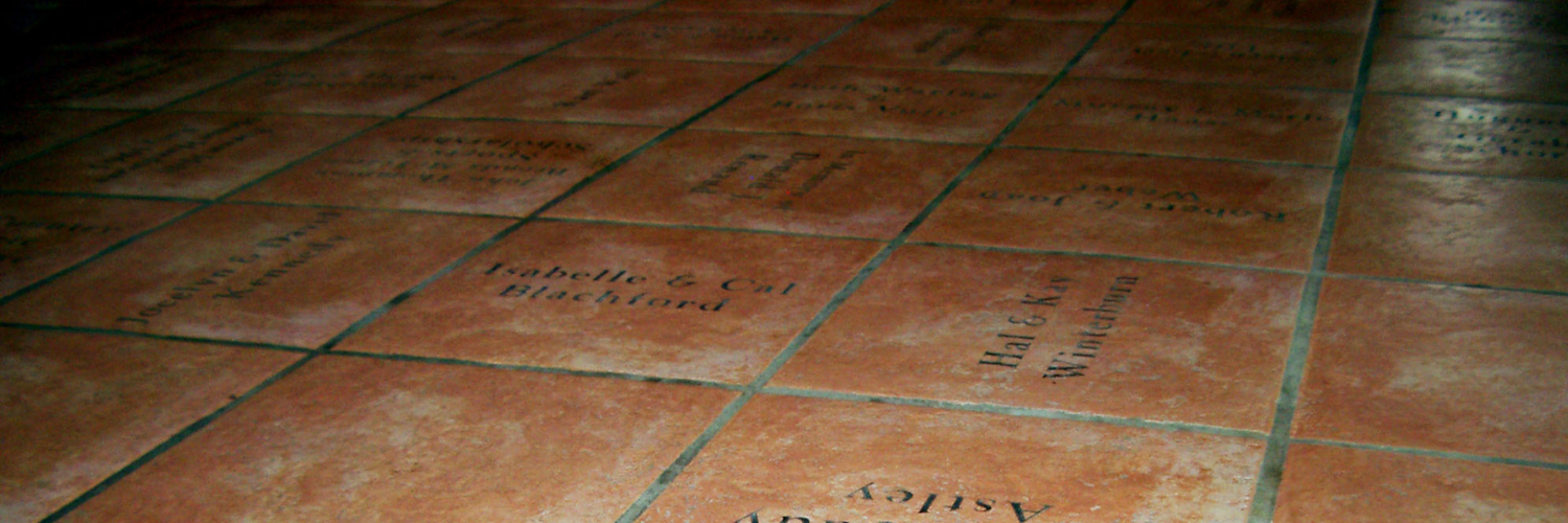 Beige engraved floor tiles at the St. Jacobs Schoolhouse Theatre