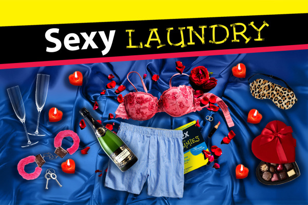 A vibrant promotional image for 'Sexy Laundry'. The background features clothing, champagne glasses and wine scattered on a a blue bedding with the title at the top.