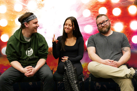 Kale Penny, Mariah Campos and Aaron Walpole in front of the Rock of Ages background<