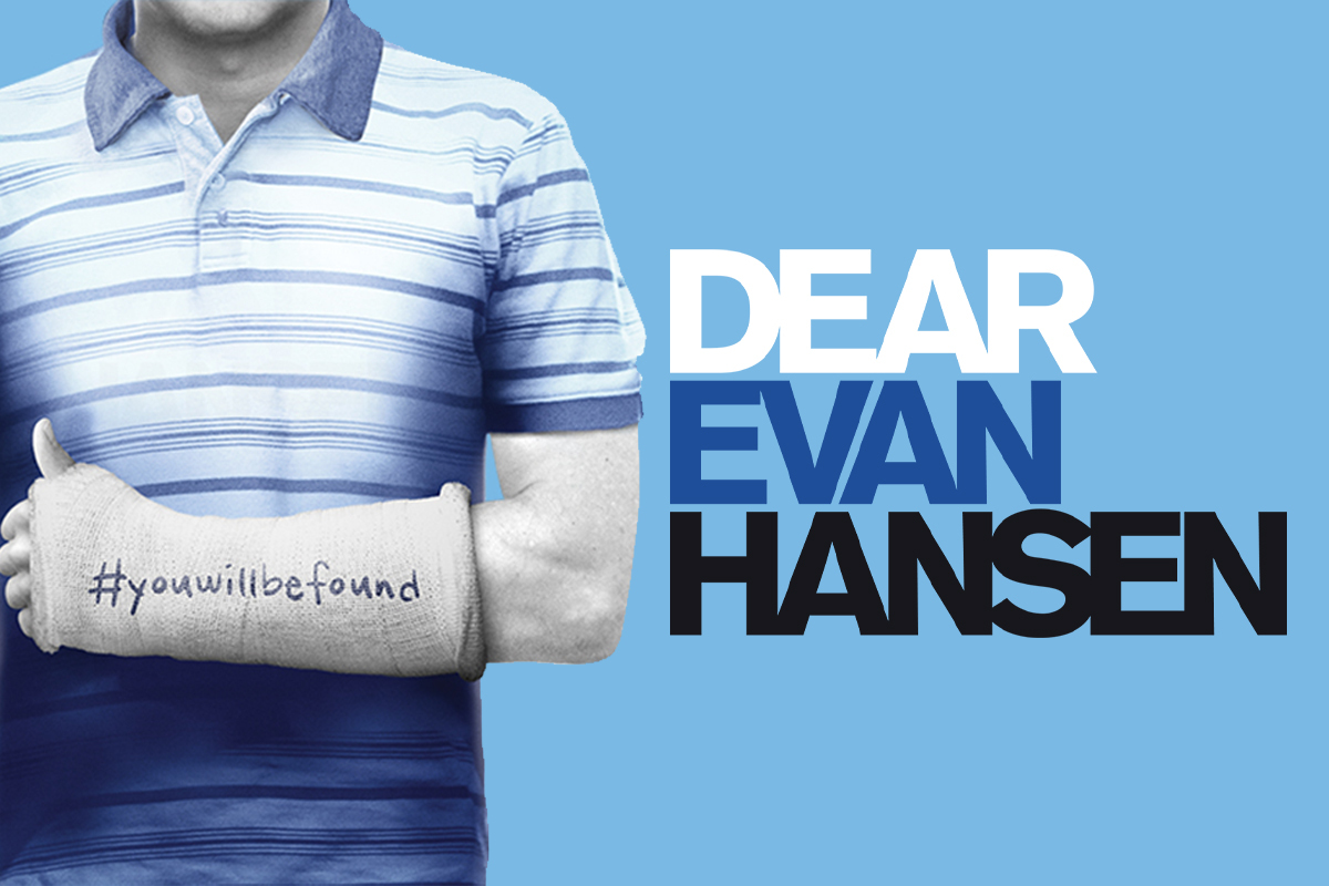 The title Dear Evan Hansen appears in bold silver letters against a dark blue starry background, illuminated by a soft spotlight that creates a theatrical, Broadway-inspired atmosphere.