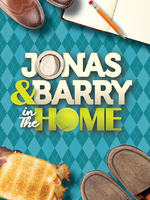 The title Jonas and Barry in the Home appears in bold silver letters against a dark blue starry background, illuminated by a soft spotlight that creates a theatrical, Broadway-inspired atmosphere.