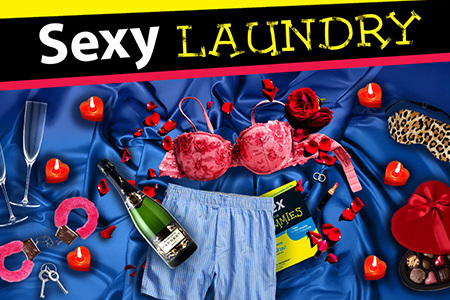 The title Sexy Laundry appears in bold silver letters against a dark blue starry background, illuminated by a soft spotlight that creates a theatrical, Broadway-inspired atmosphere.