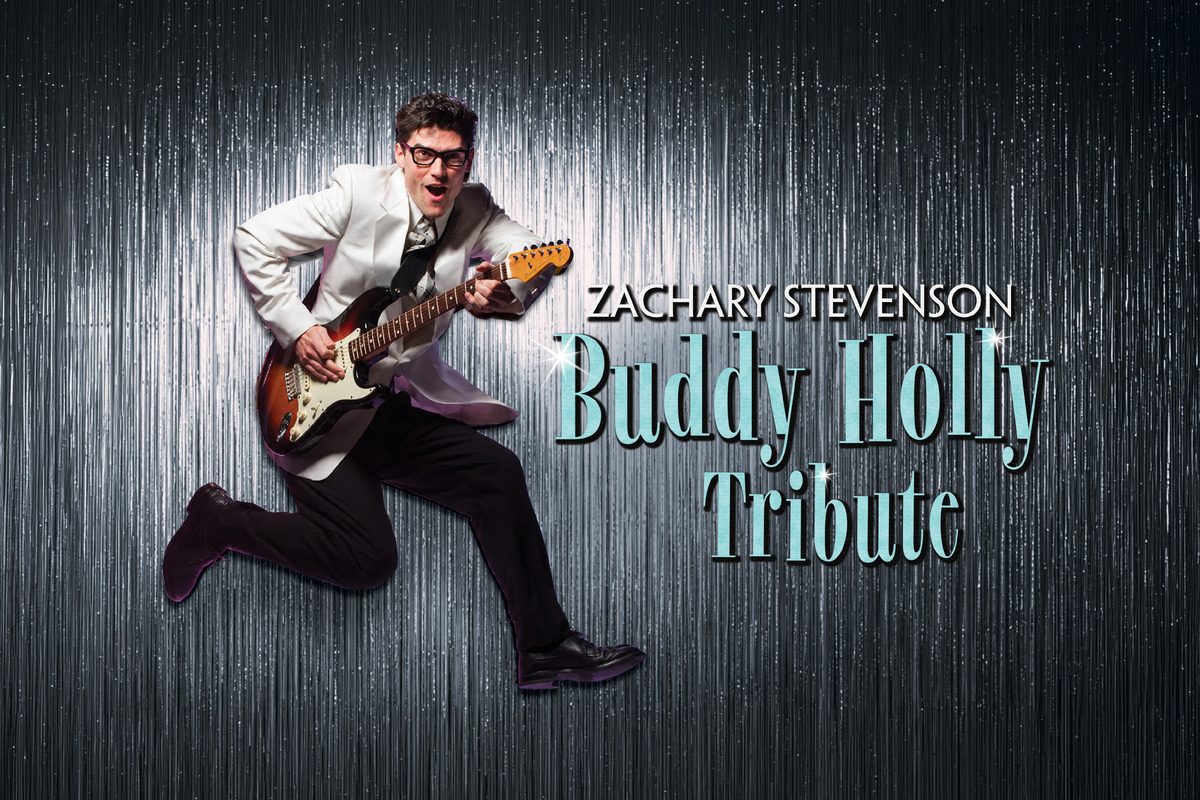 Promotional artwork for Zachary Stevenson’s Buddy Holly Tribute. Zachary Stevenson is pictured mid-jump in a white dinner jacket, black trousers, black-framed glasses, and tie while playing a sunburst electric guitar. He smiles with an energetic perf